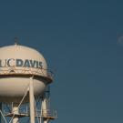 The gibbous moon rises over Water Tower on March 26, 2021.