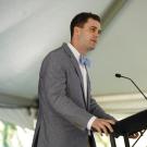 Minnick gives a speech in front of the podium at the Graduate Center Grand Opening Celebration 